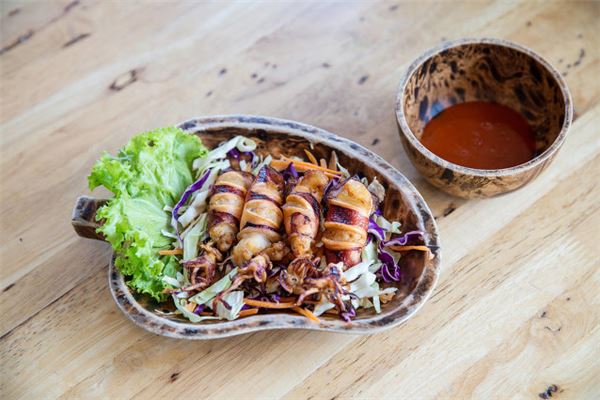 夢見吃魷魚_周公解夢