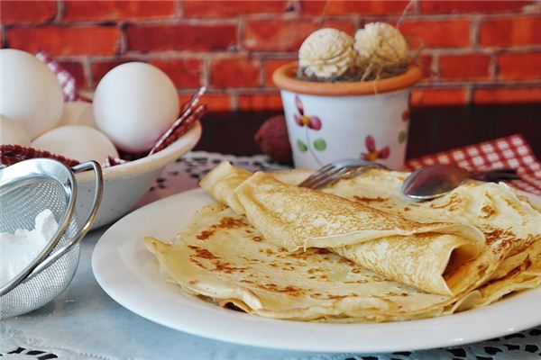 女人夢見自己吃餅_周公解夢
