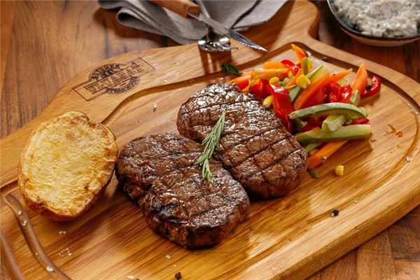 女人夢見大塊熟牛肉_周公解夢