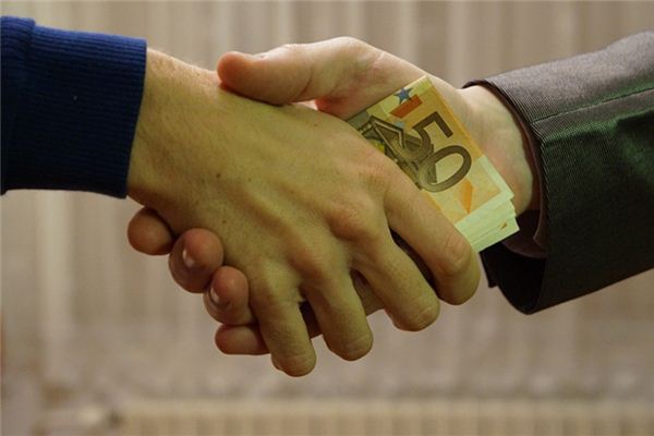 夢見拿了別人的錢_周公解夢